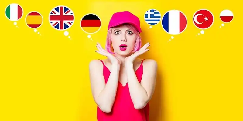 © Masson - stock.adobe.com | surprised young woman and flags