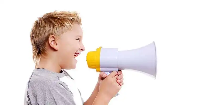 © iagodina - Fotolia | Boy speaking through a megaphone side view